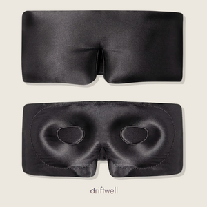 Driftwell Contour Silk Sleep Mask in Black, shown from the outside and from the inside with both moulded eye cups