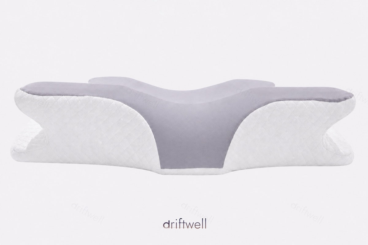 The pillow with its taller edge presented, seen straight on
